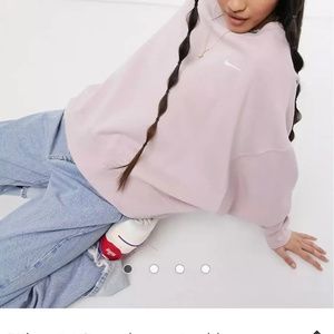 Nike mini Swoosh oversized boxy sweatshirt in light pink